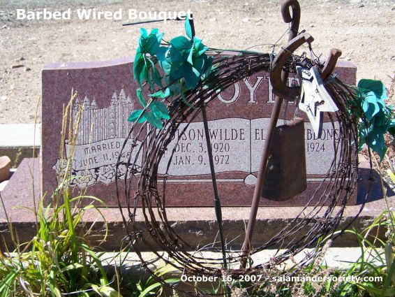 Barbed wire cow bell Mormon grave marker.