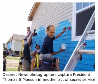 Mormon President Thomas S Monson being photographed by Deseret News painting Widow Anderson's home.